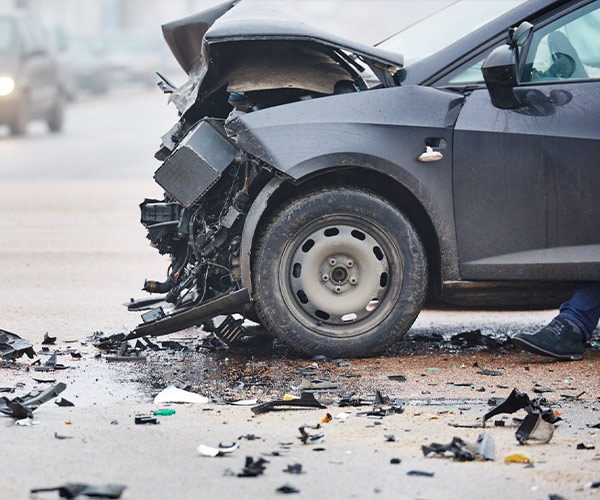 Car with damaged front end from lyft car wreck in Houston